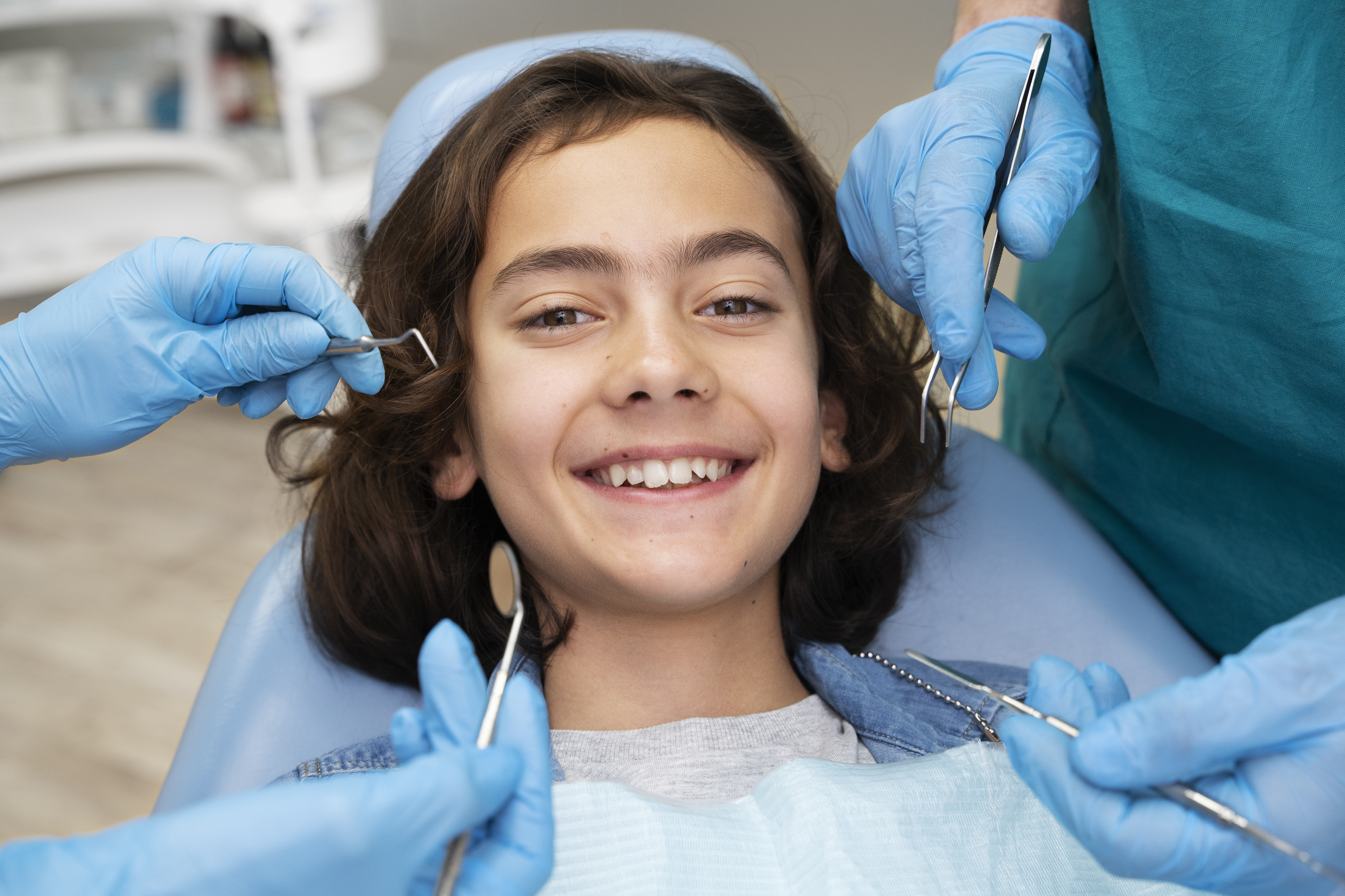 Dentist performing a professional clean